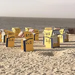Апартаменты Strandnahe Souterrain-ferienwohnung Haus Sonneneck 3 Куксхафен