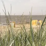 Апартаменты Strandnahe Souterrain-ferienwohnung Haus Sonneneck 3 *